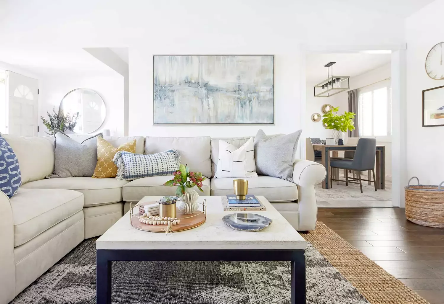 40 Smart Small Apartment Living Room Ideas That Maximize Your Space and Style 32 Use Art to Define the Walls
