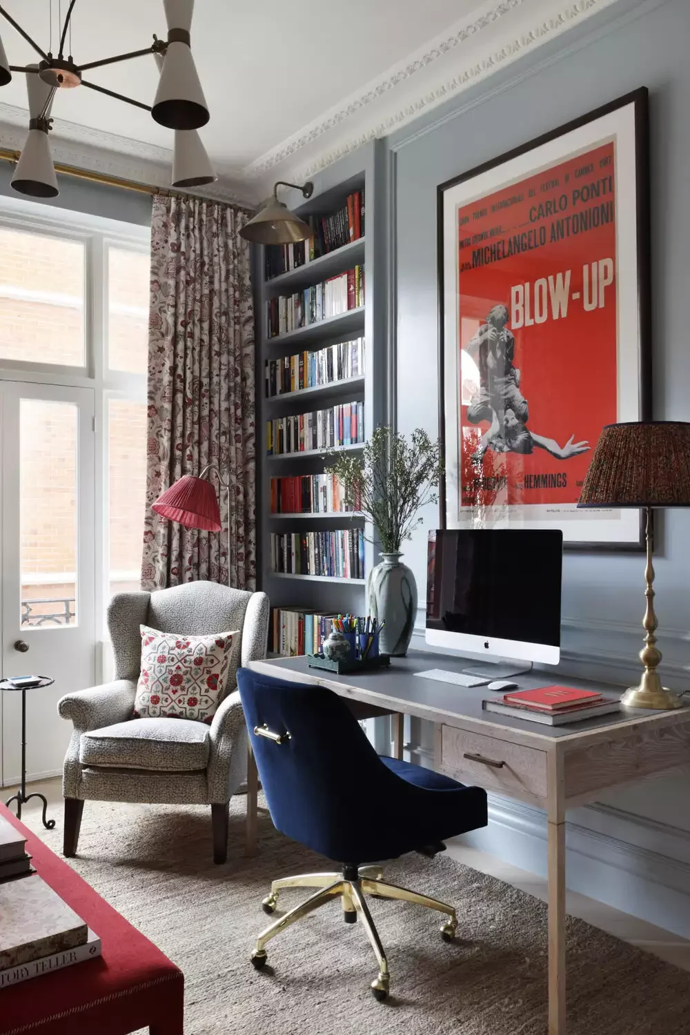 21 Brilliant Ways to Seamlessly Integrate a Workspace into Your Living Room 3 Use Bold Color