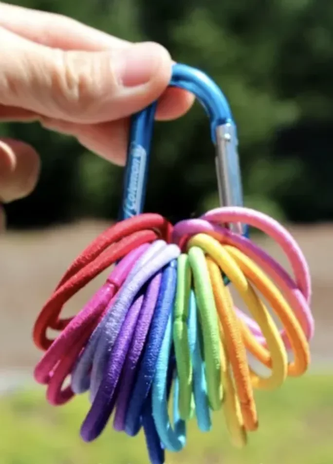 49 Brilliant Storage Solutions to Transform Every Room in Your Home Use Carabiners for Hair Ties and Rubber Bands
