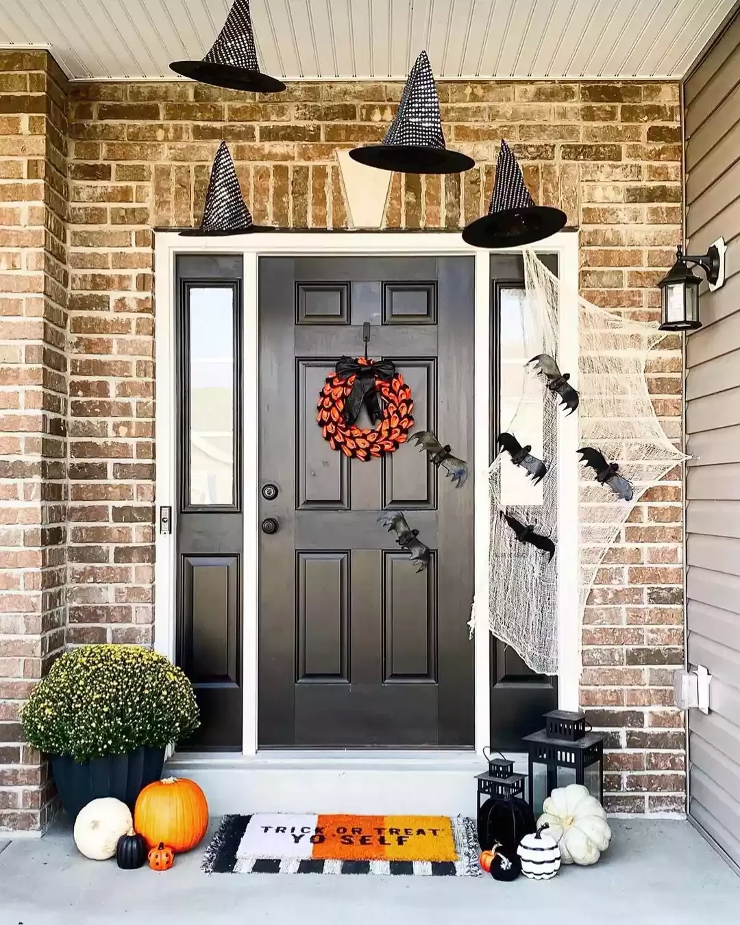 33 Spooktacular Halloween Front Porch Ideas That'll Make Your Home the Neighborhood's Must-See Destination 22 Use Cheese Cloth as Spider Webs