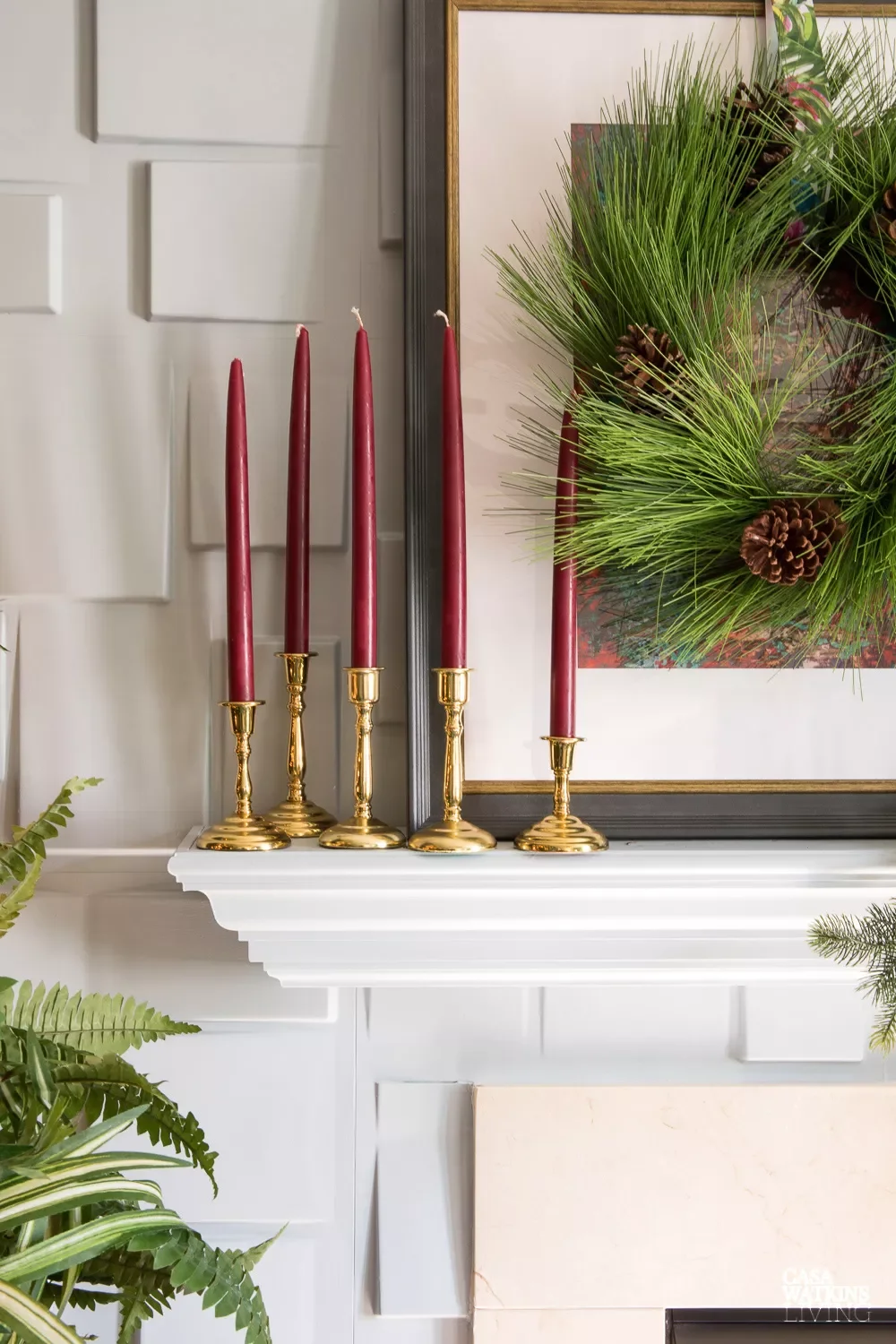 115 Stunning Christmas Decorating Ideas to Transform Your Home This Holiday Season Use Colorful Candles on the Mantel