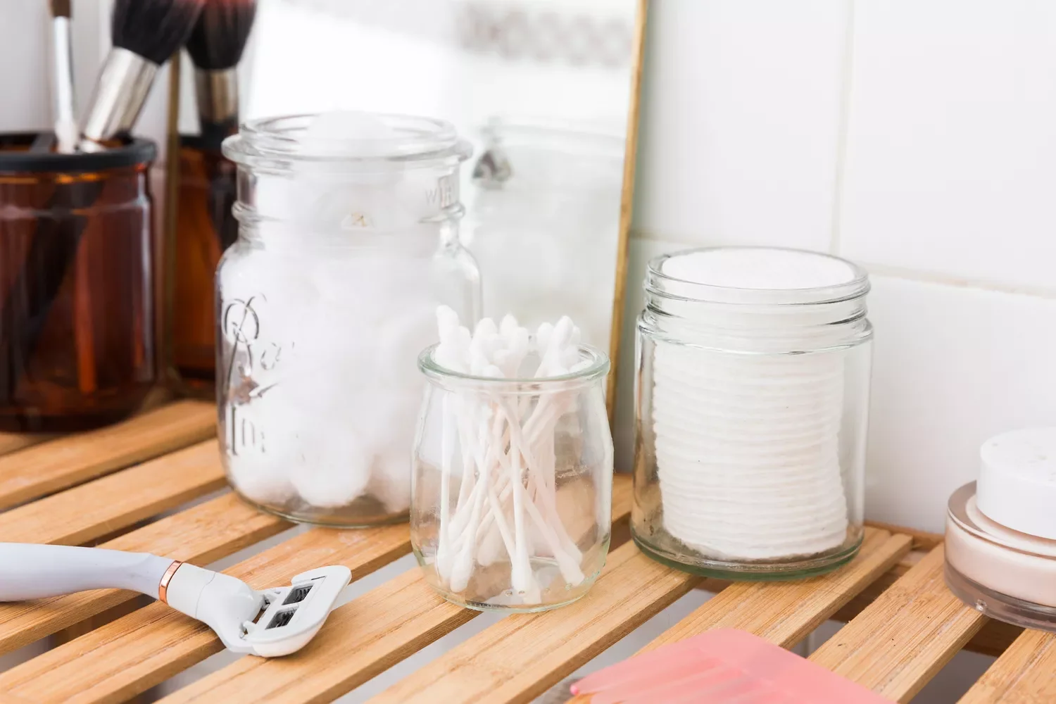 35 Brilliant Bathroom Organization Ideas That Will Transform Your Space Instantly Use Cups or Jars for Storage