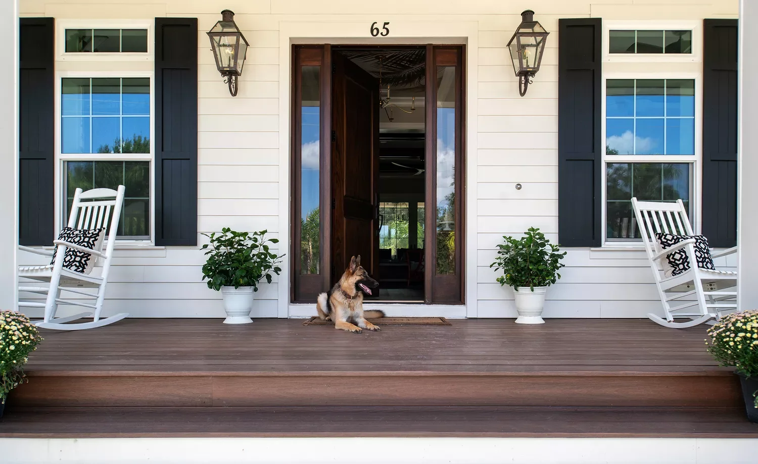 62 Warm and Inviting Front Porch Design Ideas That Welcome Everyone Home 33 Use Dark Wood Tones