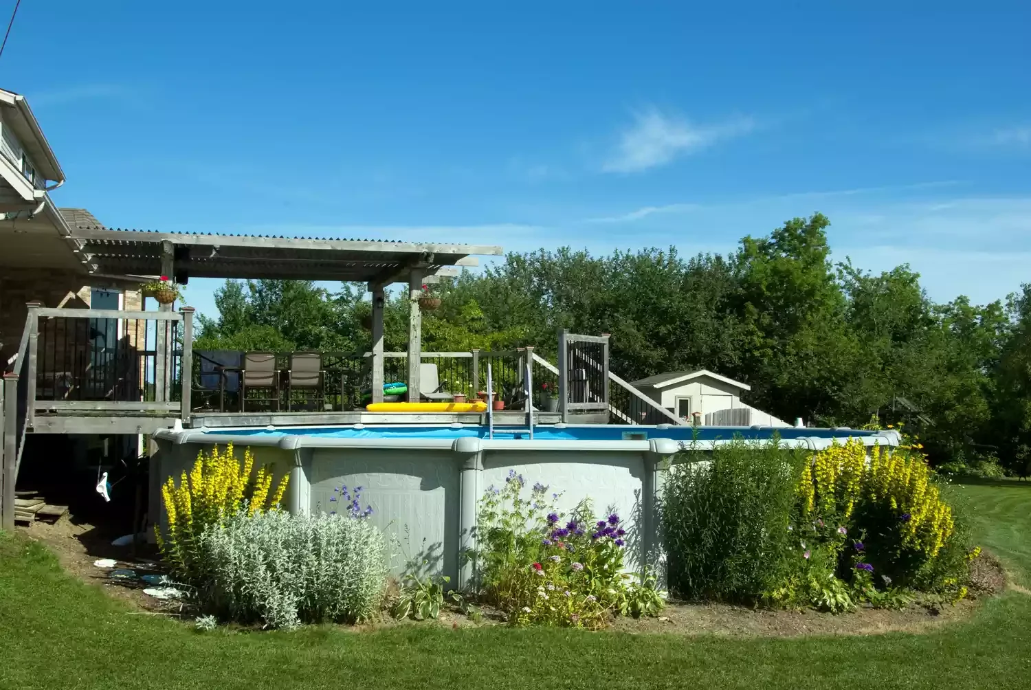 20 Stunning Above-Ground Pool Landscaping Ideas to Transform Your Backyard 3 Use Fast-Growing Herbs and Shrubs