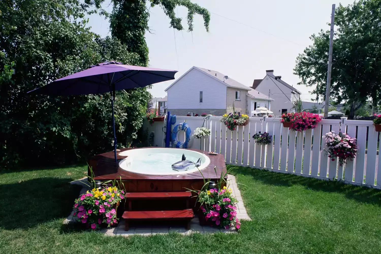 20 Stunning Above-Ground Pool Landscaping Ideas to Transform Your Backyard 18 Use Flowers for a Cozy Look