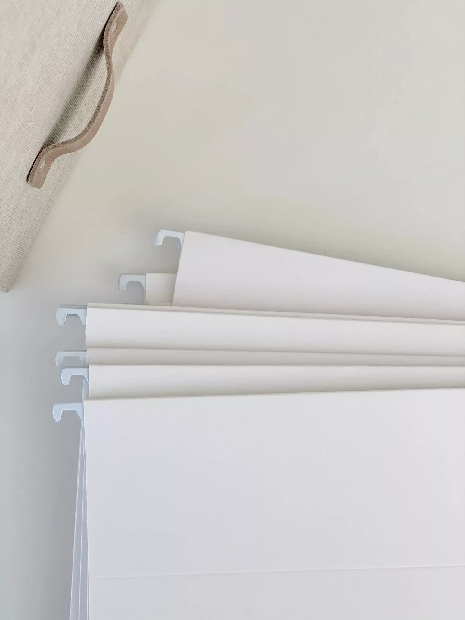 22 Creative Ways to Organize and Display Your Photo Collection at Home 6 Use Hang File Containers