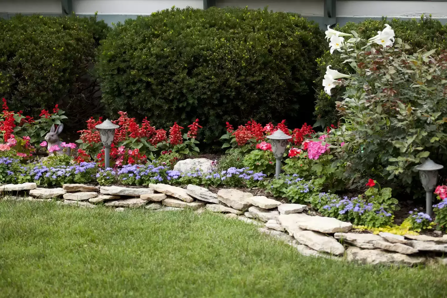 21 Budget-Friendly Retaining Wall Ideas That Transform Your Landscape Use Limestone to Line Beds