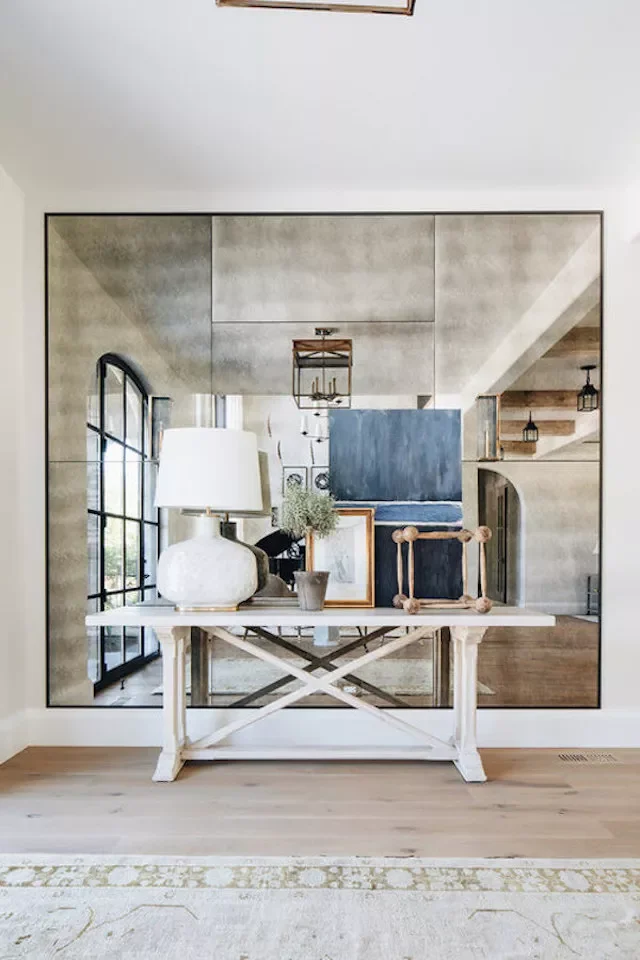 31 Brilliant Small Entryway Ideas That'll Make Your Space Feel Amazing Use Mirrors to Double Space