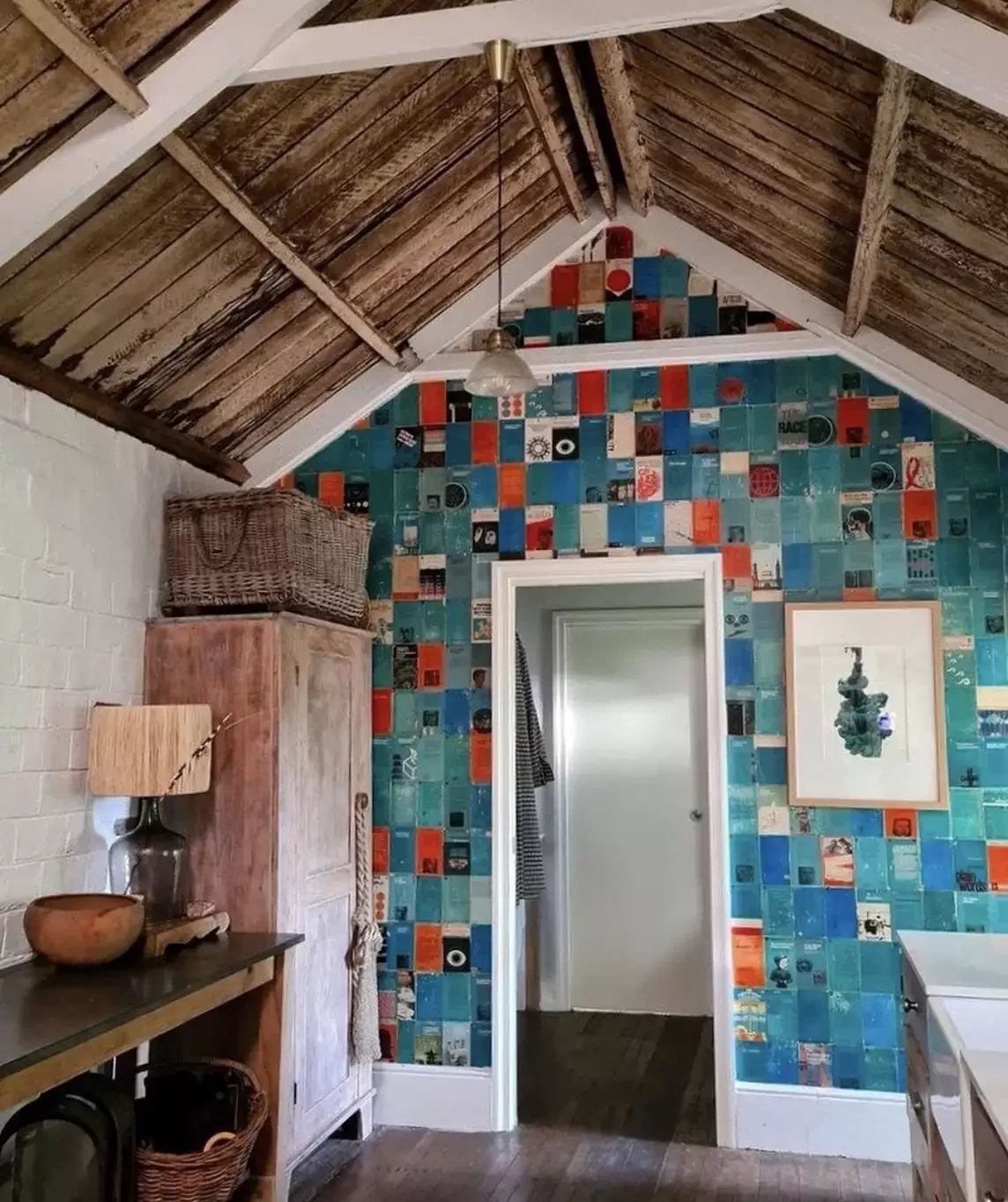 25 Beautiful Accent Wall Ideas to Transform Any Room 23 Use Vintage Book Covers