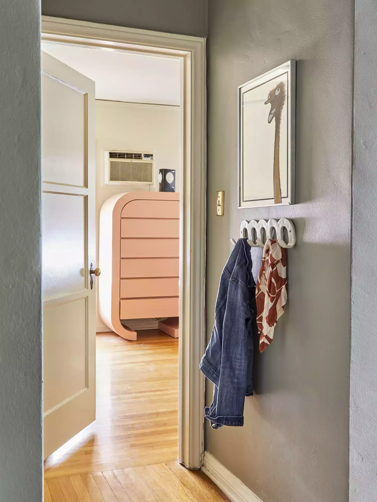 30 Smart Ways to Transform Your Narrow Hallway Into a Stylish Space 30 Use Wall-Mounted Hooks