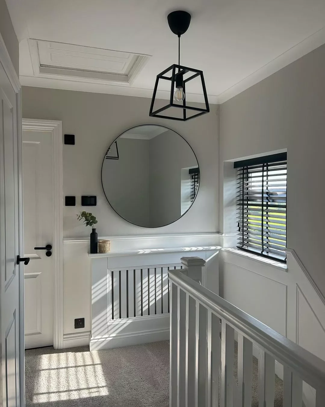 24 Creative Staircase Landing Decorating Ideas to Transform Your Space 8 Use Wall Space to Your Advantage