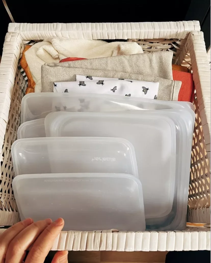 18 Brilliant Ways to Organize Your Food Storage Containers Use a Bin for Stasher Bags