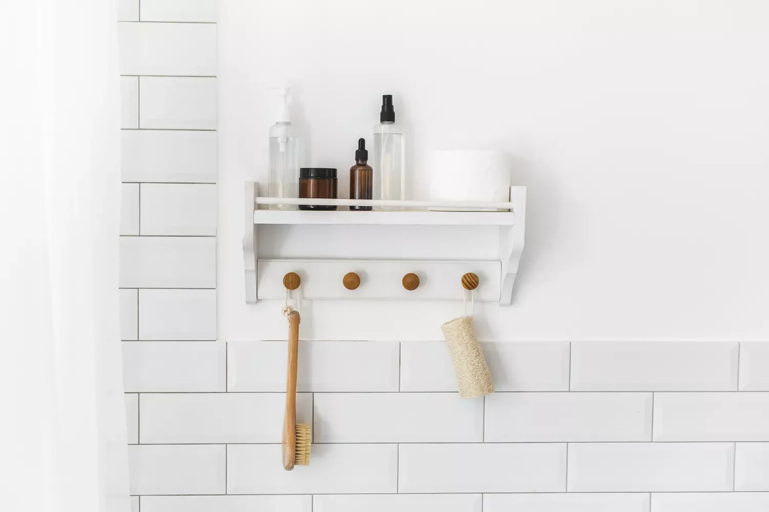 35 Brilliant Bathroom Organization Ideas That Will Transform Your Space Instantly Use a Hook Rack Over Counter Space