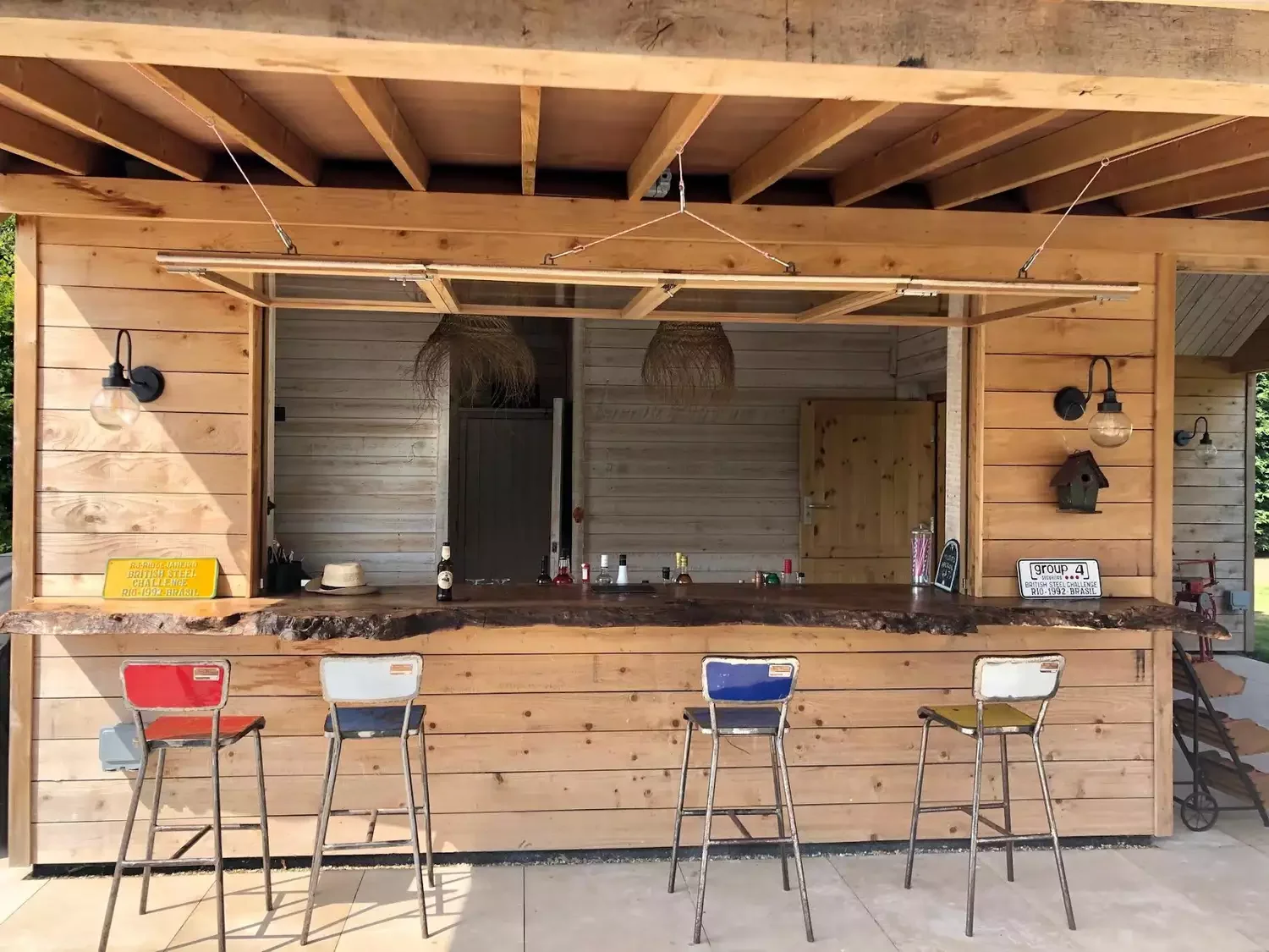 40 Stunning Outdoor Bar Ideas to Transform Your Backyard Entertainment Space 37 Use a Live Edge Bar Counter