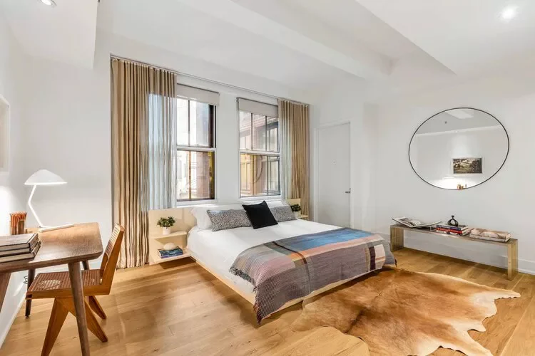 35 Creative Apartment Bedroom Ideas to Transform Your Small Space 31 Use a Low Bed Frame Near a Window