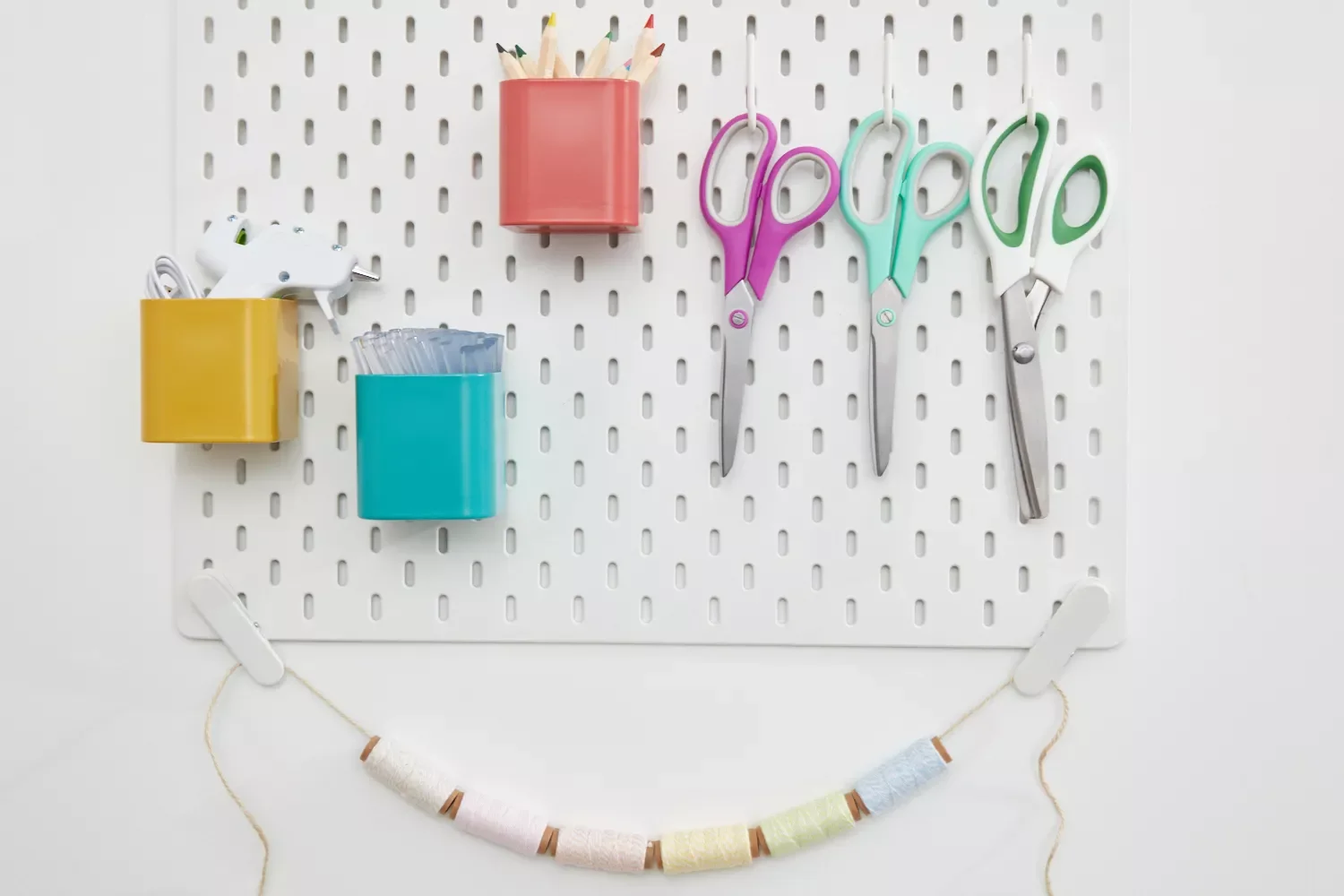 15 Brilliant Ways to Organize Your Craft Room Like a Pro Use a Pegboard for Vertical Storage