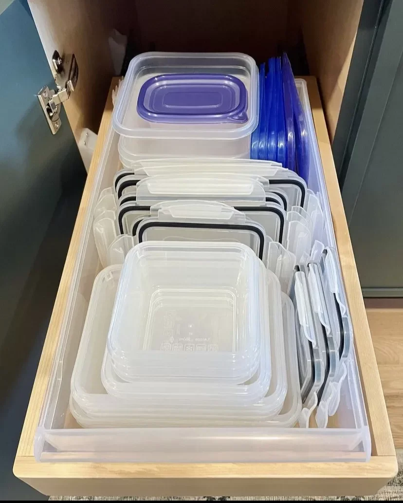 18 Brilliant Ways to Organize Your Food Storage Containers Use a Pull-Out Drawer