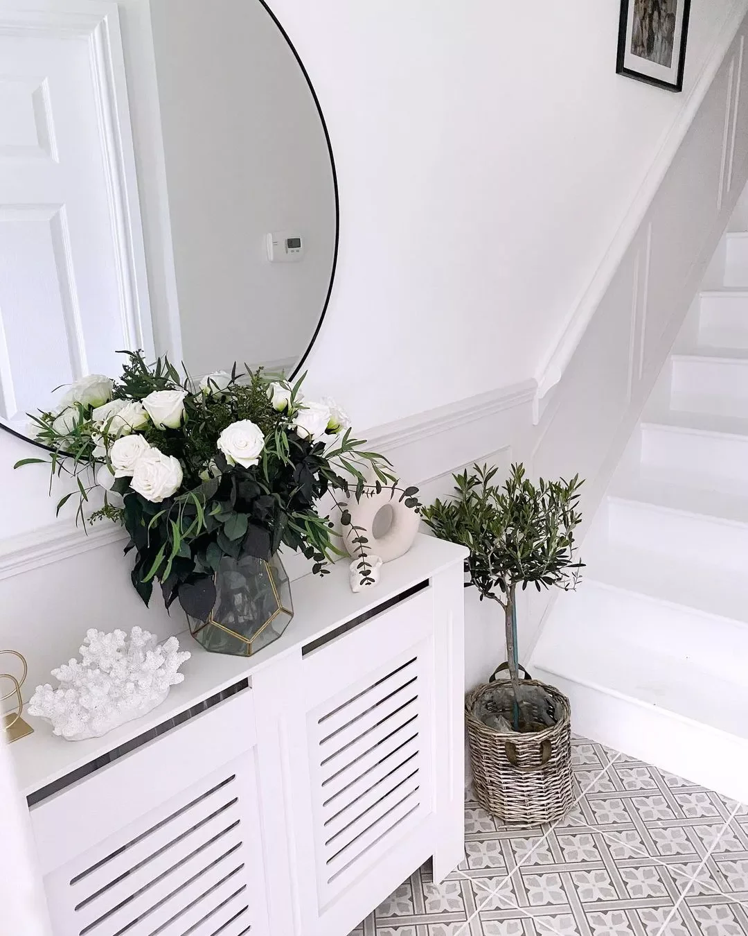 30 Brilliant Storage Solutions to Transform Your Small Apartment Use a Radiator Cover