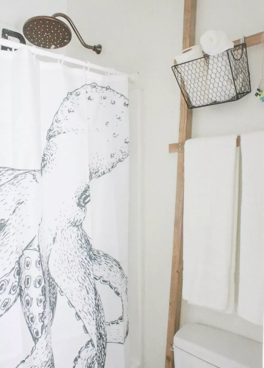 43 Smart Bathroom Storage Solutions That Maximize Every Inch Use a Storage Ladder for Towels