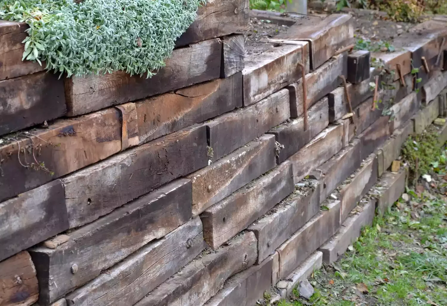 Use a Wood Retaining Wall as a Fence