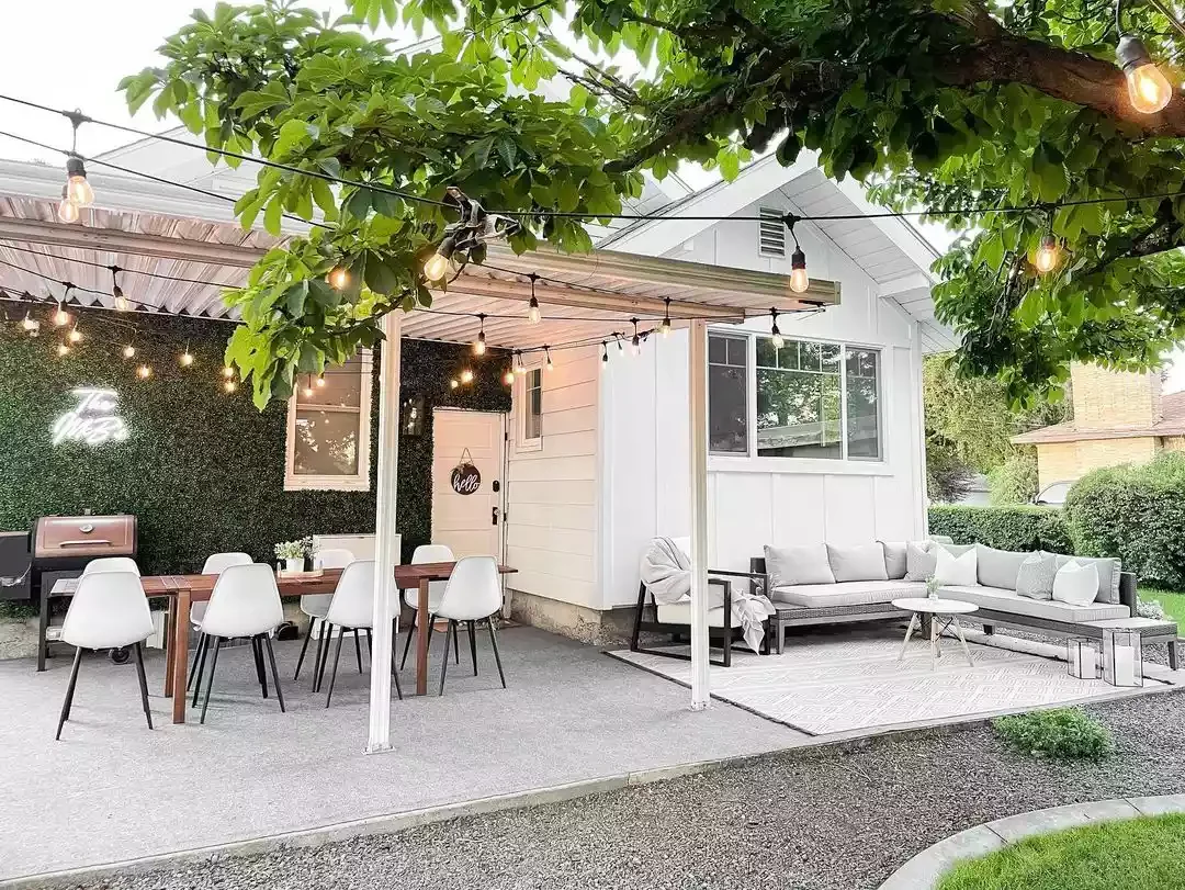 30 Beautiful Ways to Transform Your Patio with String Lights 6 Use the Roof