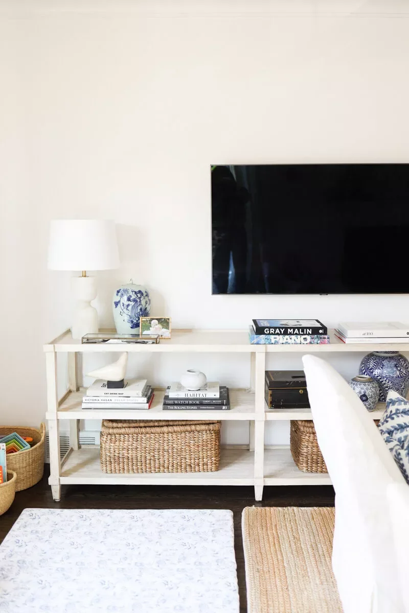 21 Beautiful Ways to Style Your TV Console Like a Pro 4 Utilize Cute Baskets