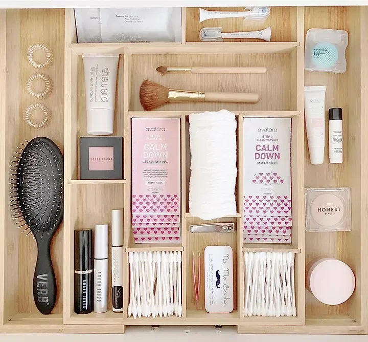 20 Smart Ways to Transform Your Bathroom Cabinet Storage Utilize a Bamboo Drawer Divider