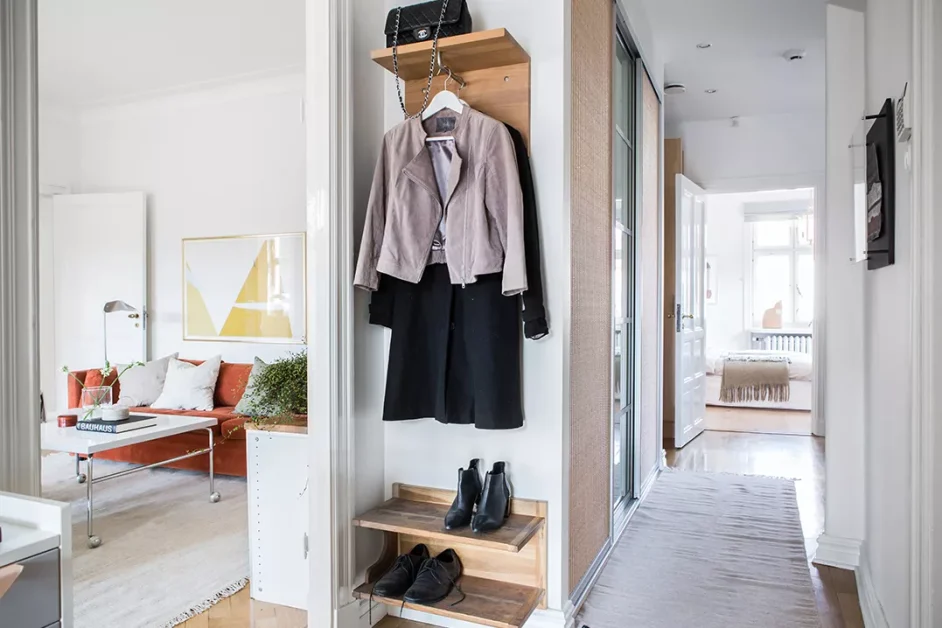 22 Breathtaking Entryway Designs That Create Stunning First Impressions 13 Utilizing Every Inch of Vertical Wall Space