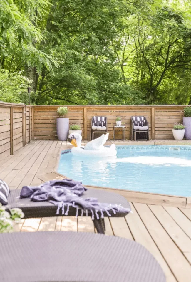 20 Stunning Above-Ground Pool Landscaping Ideas to Transform Your Backyard 2 Vary the Heights of Planters