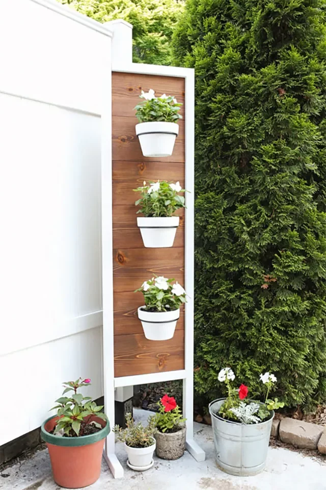 35 Corner Garden Designs That Transform Every Outdoor Space Vertical Plant Stand