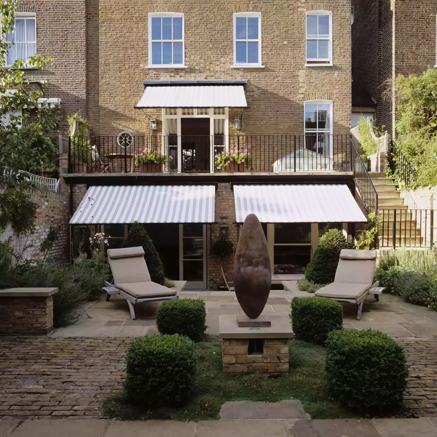 23 Stunning Patio Awning Ideas to Transform Your Outdoor Living Space 11 Victorian Townhouse Patio Awning