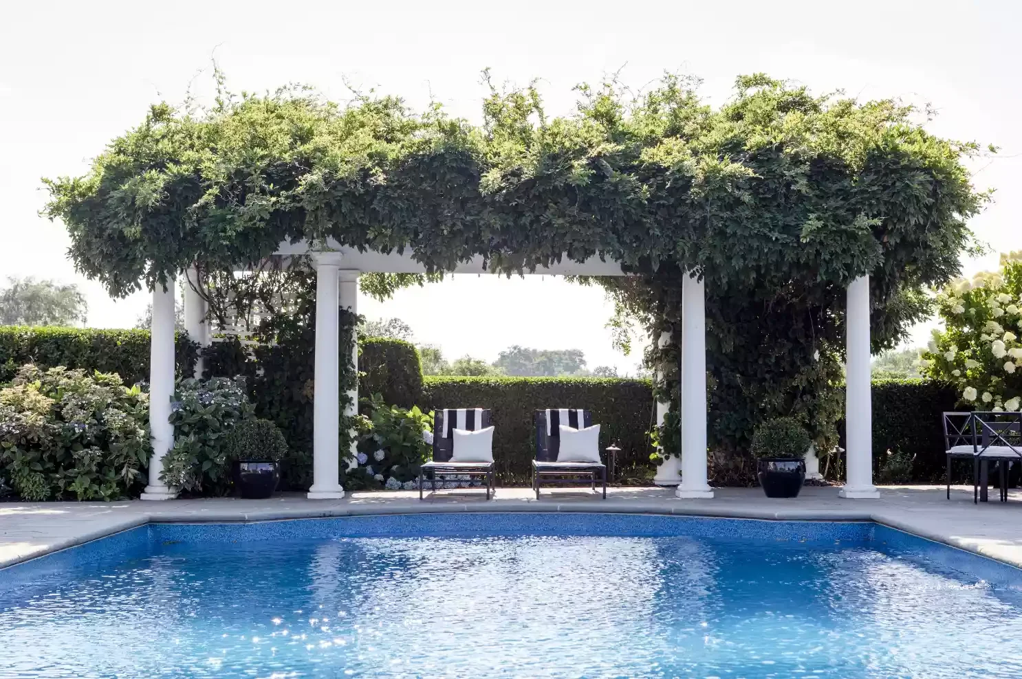 20 Stunning Pool Tile Ideas to Transform Your Swimming Area 9 Vivid Blue Pool Tiles