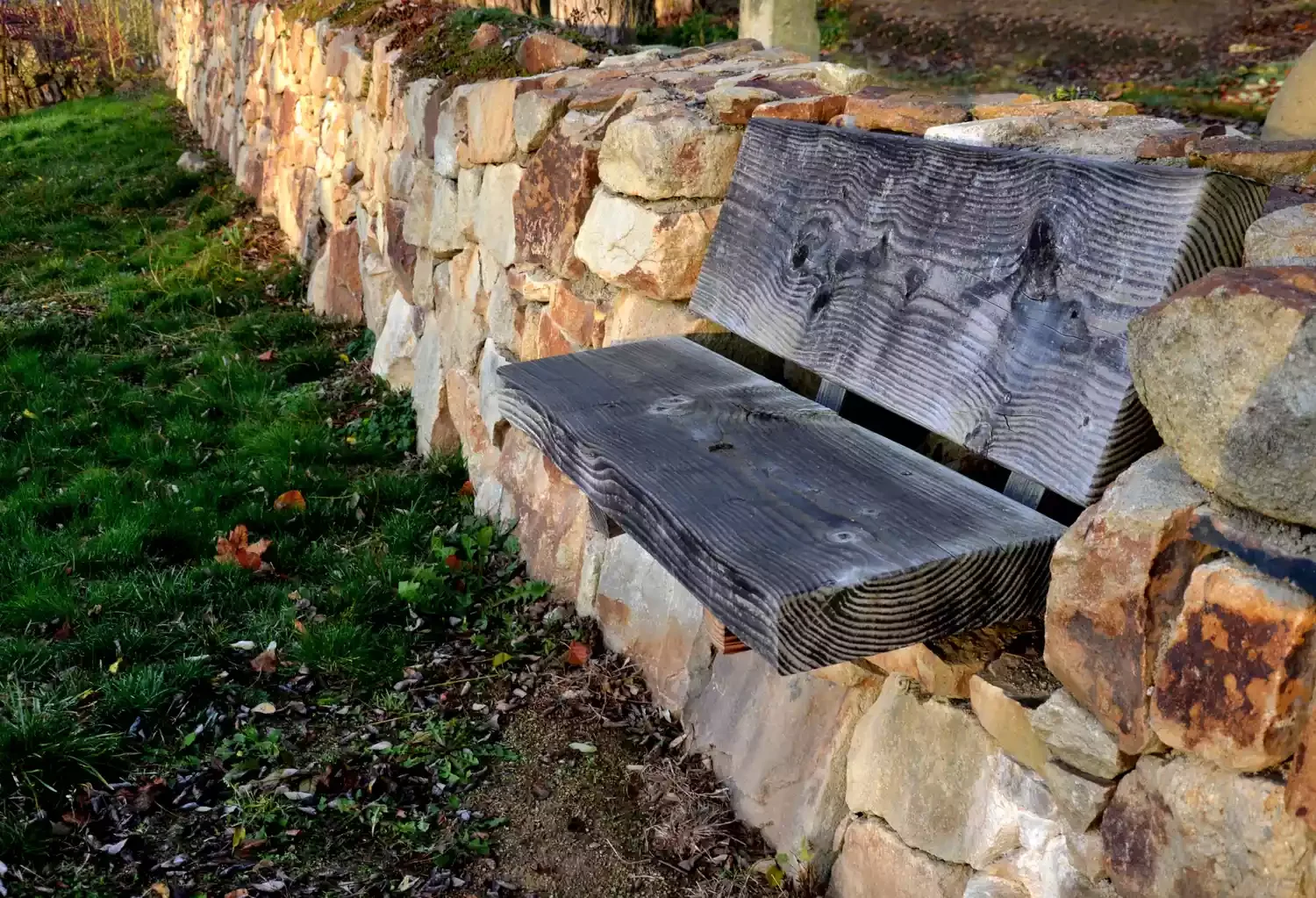 9 Creative Garden Seating Solutions That Transform Your Outdoor Space Into a Relaxing Retreat Wall-Mounted Bench