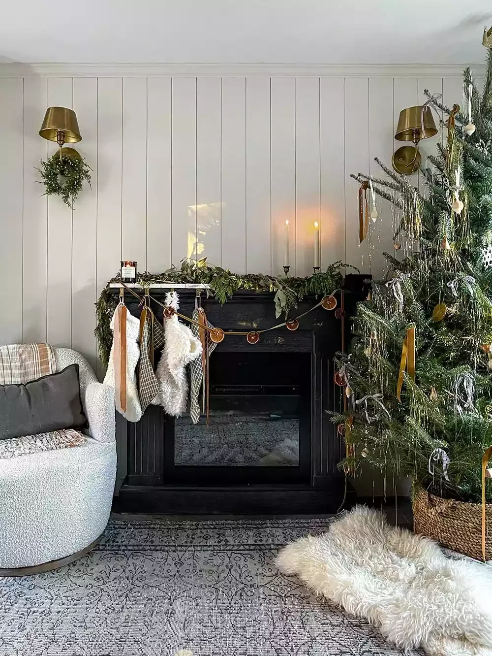 32 Stunning Christmas Wall Decorating Ideas to Transform Your Home Into a Holiday Haven 20 Wall Sconce Wreaths