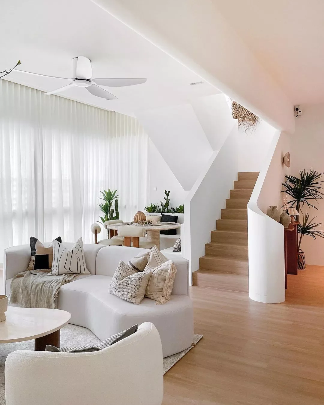 25 Fresh Window Treatment Ideas That'll Transform Every Room in Your Home 12 Wall-to-Wall Curtains