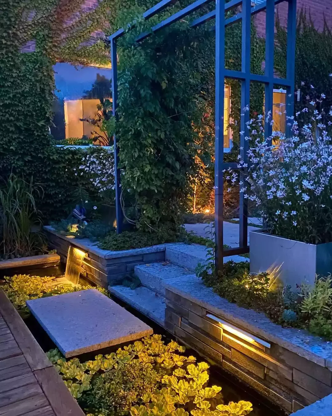 26 Backyard Lighting Ideas That Completely Transform Outdoors Water Feature Lighting