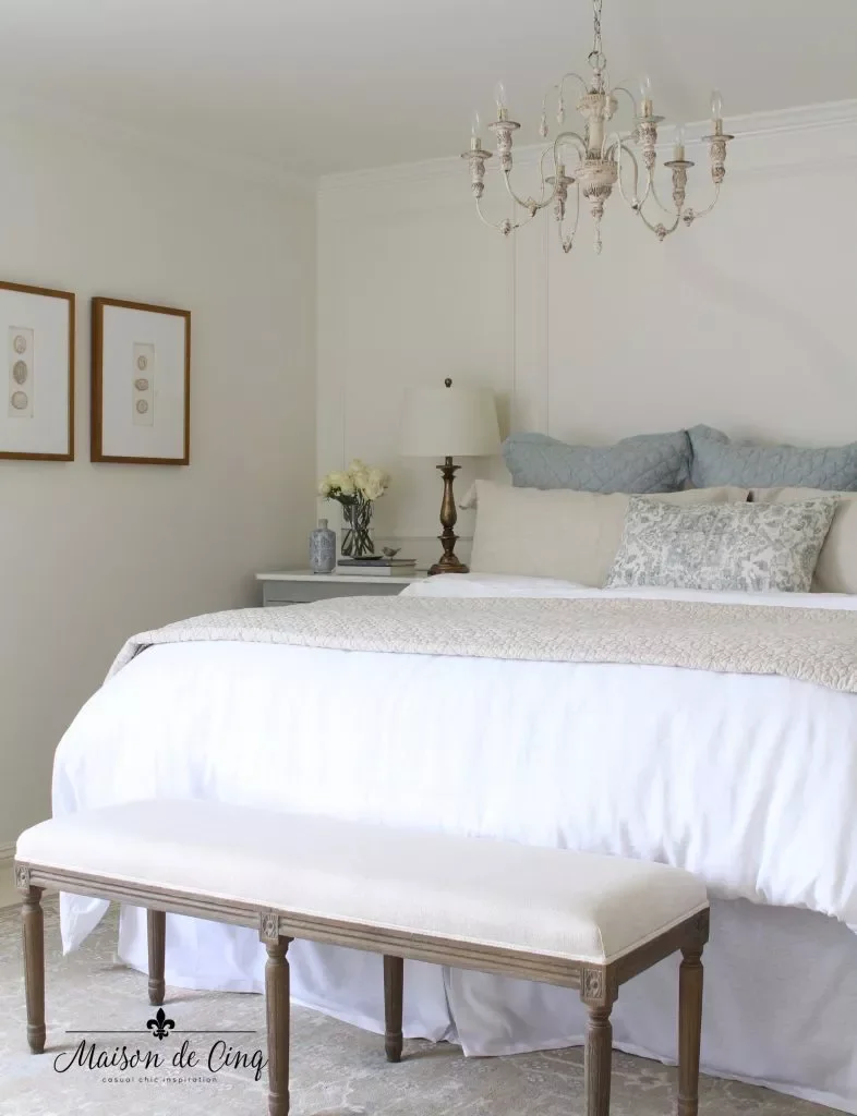 40 White Bedroom Ideas That Will Transform Your Space Into a Stunning Retreat 30 White Bedroom With Vintage Art