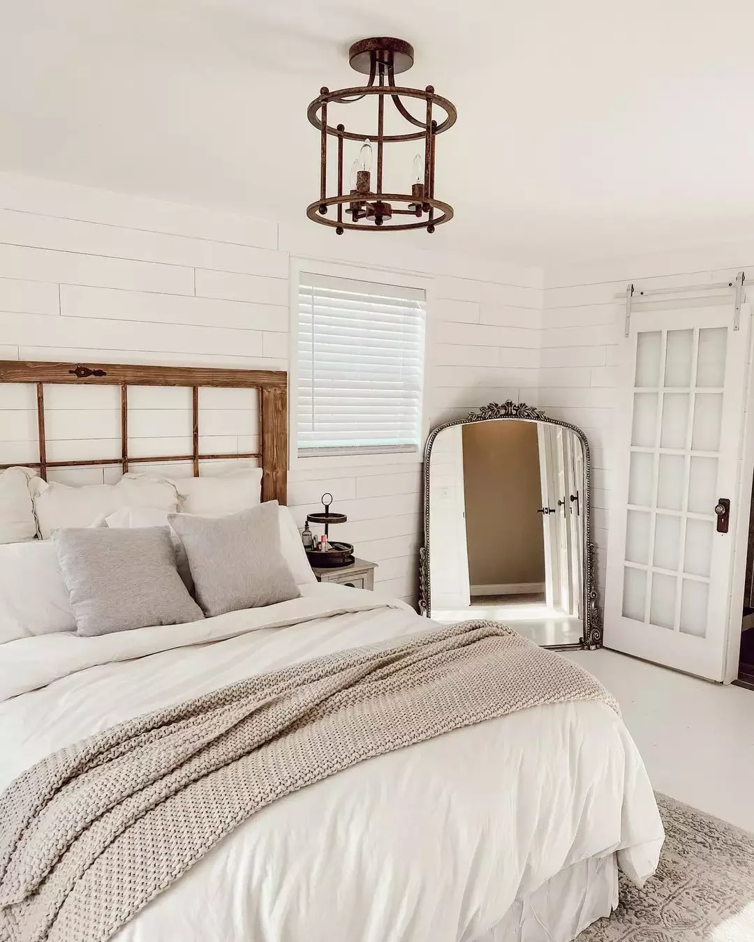 40 White Bedroom Ideas That Will Transform Your Space Into a Stunning Retreat 8 White Bedroom With a Large Mirror