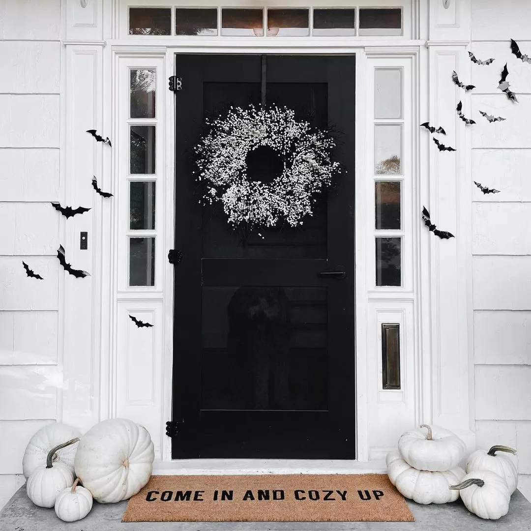 42 Quick Halloween Door Decorations You Can Create in Under an Hour 37 White Berry Wreath