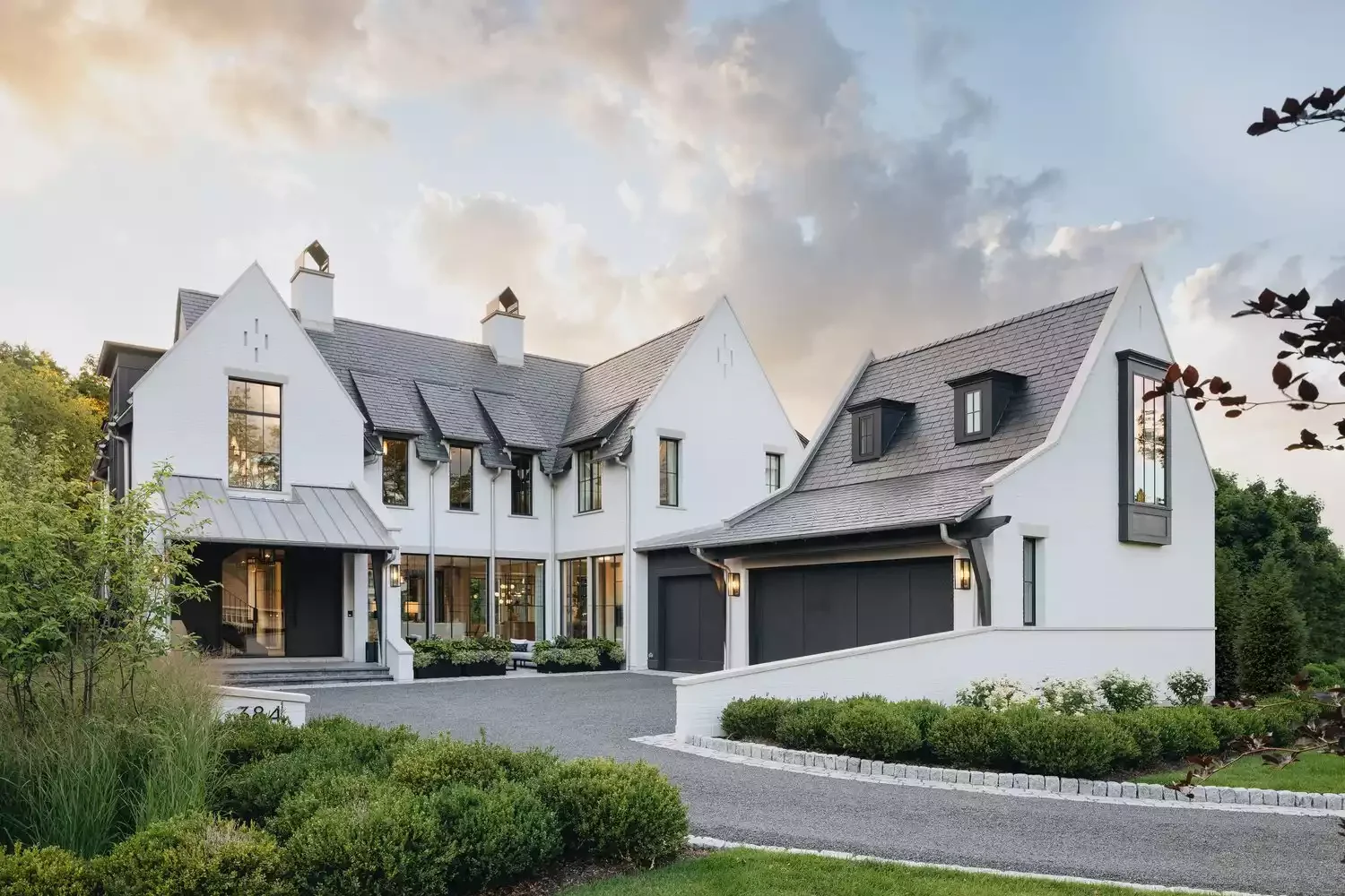 18 Stunning White Brick House Ideas to Transform Your Home's Exterior 11 White Brick With Black Trim