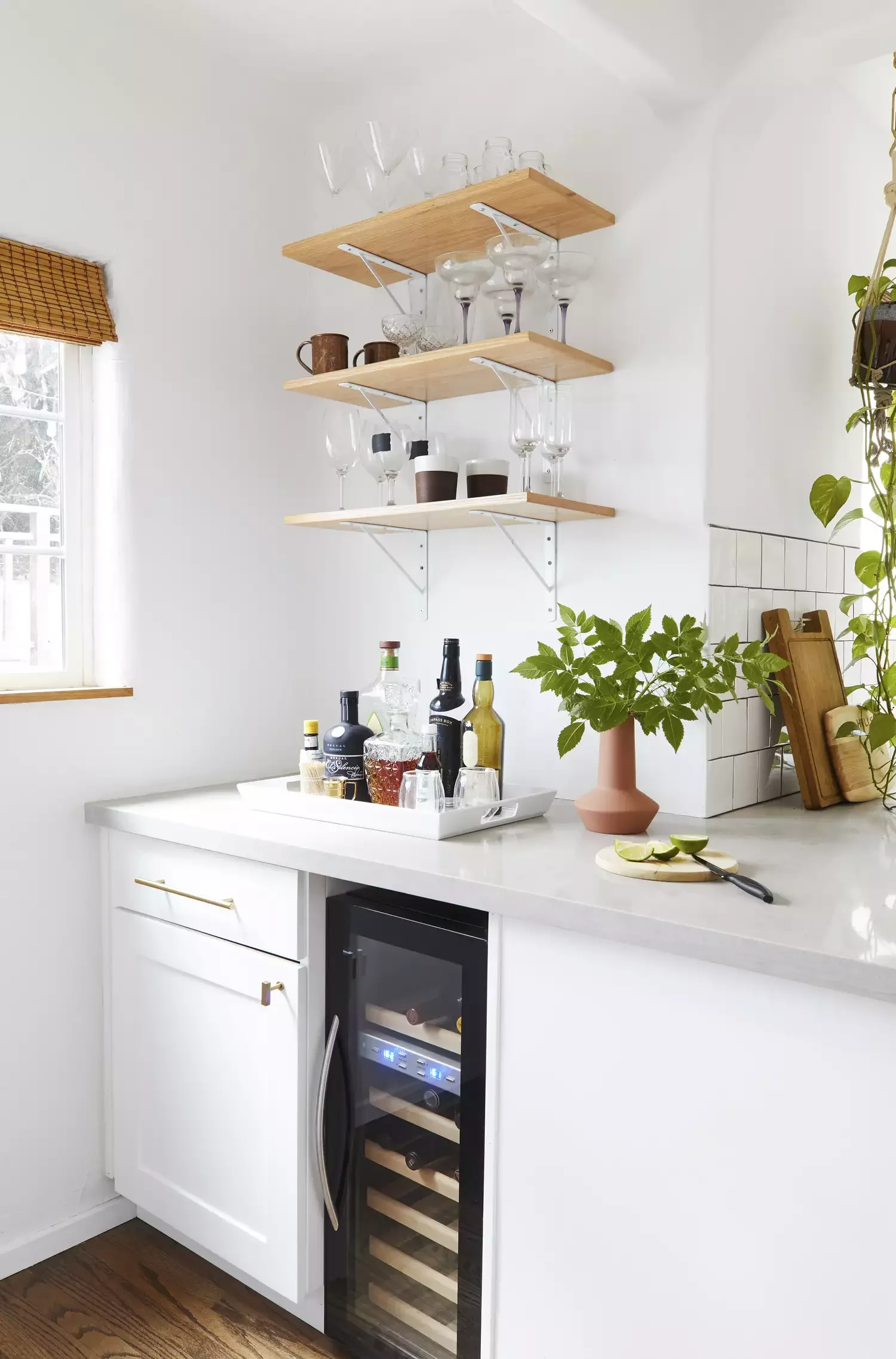 White Cabinets and Wood Floating Shelves