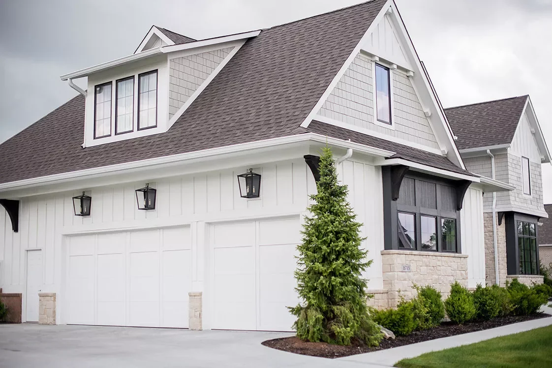 52 Stunning Garage Door Ideas That Will Transform Your Home's Curb Appeal White Sectional Doors