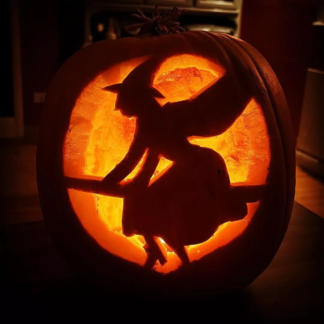 77 Creative Pumpkin Carving Ideas That'll Transform Your Fall Decorating Game 20 Witch Carved Pumpkin