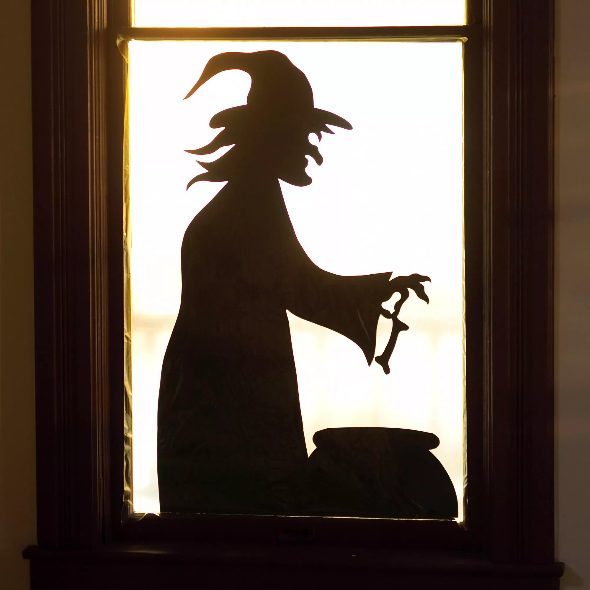 80 Quick Halloween Crafts You Can Complete in One Day 28 Witch at the Window Silhouette