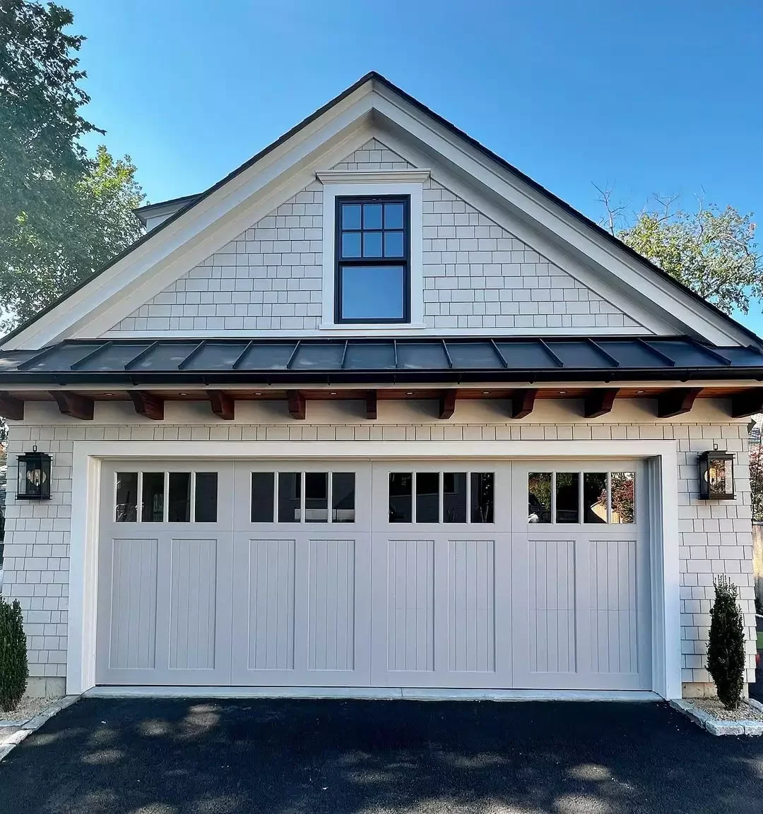 52 Stunning Garage Door Ideas That Will Transform Your Home's Curb Appeal Wood-Look Sectional Door