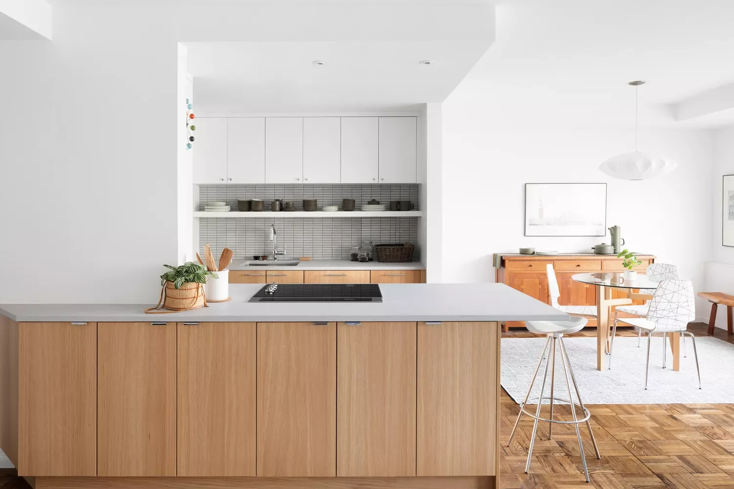 Wood-Wrapped Island and White Cabinets