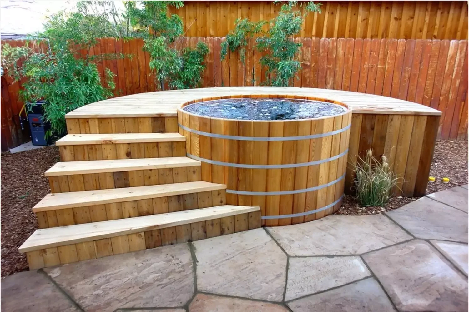 30 Stunning Hot Tub Deck Designs to Create Your Dream Backyard Retreat 29 Wooden Barrel Hot Tub Deck