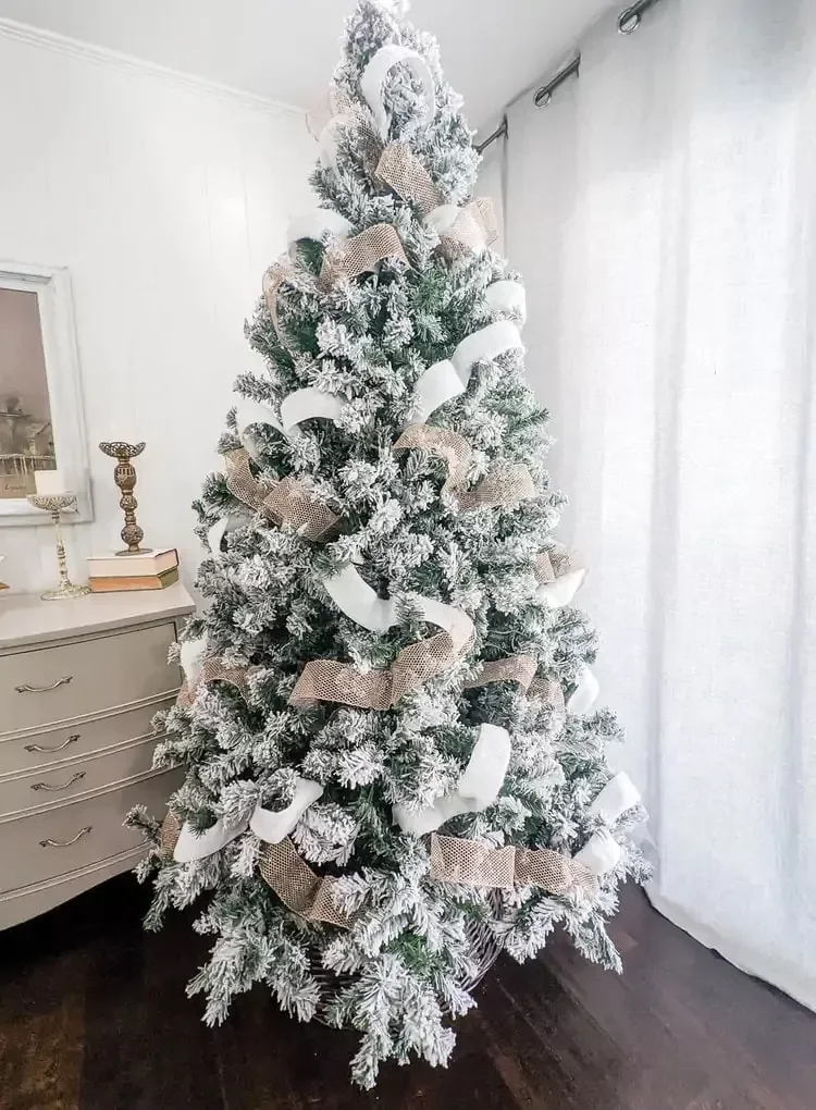 27 Stunning Flocked Christmas Tree Ideas That Transform Your Holiday Decor 21 Wrap It in Ribbon