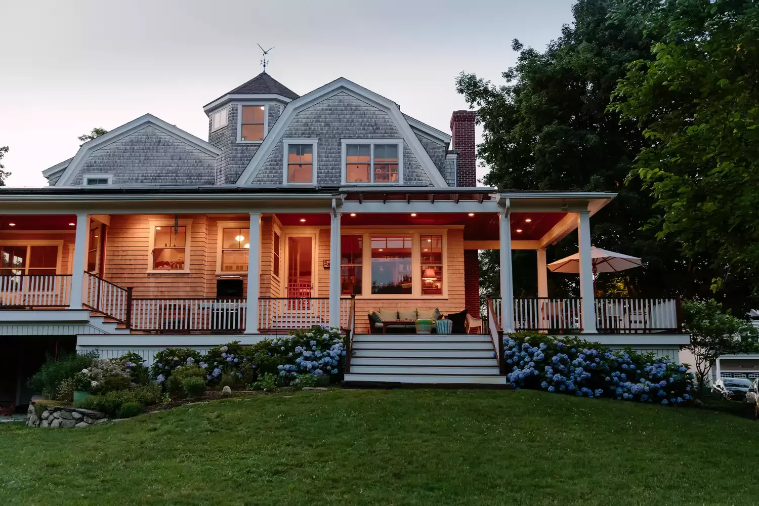 41 Stunning Outdoor Lighting Ideas That Will Transform Your Yard Into a Magical Space 13 Wraparound Porch Lighting